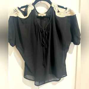 Cold shoulder, sheer top